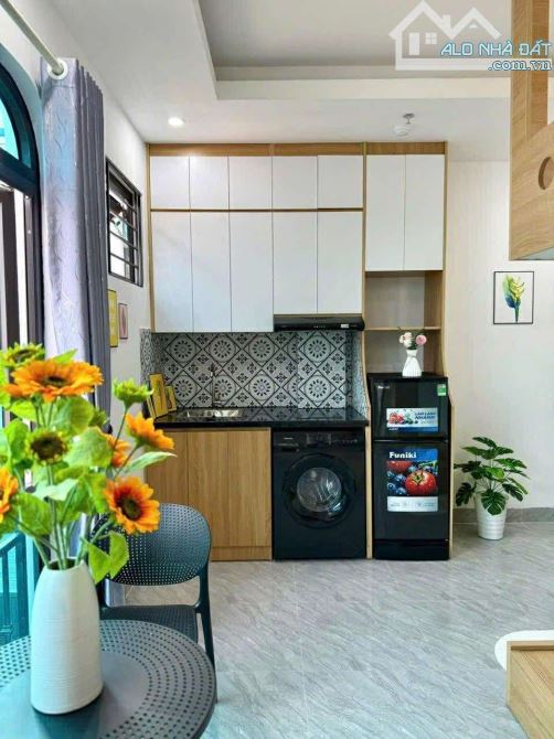Toà CHDV Đê La Thành, 70m2*7T, MT 5M, 18 PKK, ngõ ô tô, đủ GPXD/PCCC, dòng tiền 7%/năm! - 1