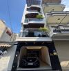 BÁN NHÀ LÝ SƠN – LONG BIÊN 50m² x 7 tầng thang máy • Gara 2 ô tô • Full nội thất cao cấp