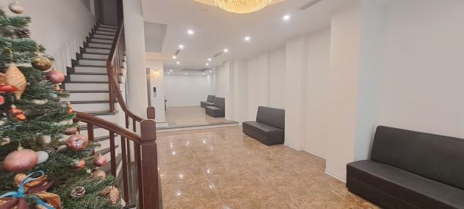 Tòa nhà phố Trần Hưng Đạo – diện tích 110m², xây 7 tầng bề thế - 1