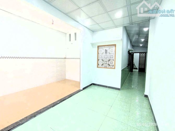 Bán nhà 2 tầng nở hậu trung tâm phường Thủ Đức hẻm xe hơi diện tích 100m2 - 10