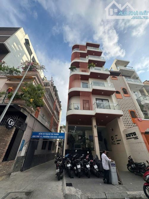 TÒA NHÀ LÔ GÓC 1 HẦM 6 TẦNG ĐẸP MẶT TIẾN SỐ 31-33 THẠCH THỊ THANH-DÒNG TIỀN CAO-GIÁ :62 TỶ - 3