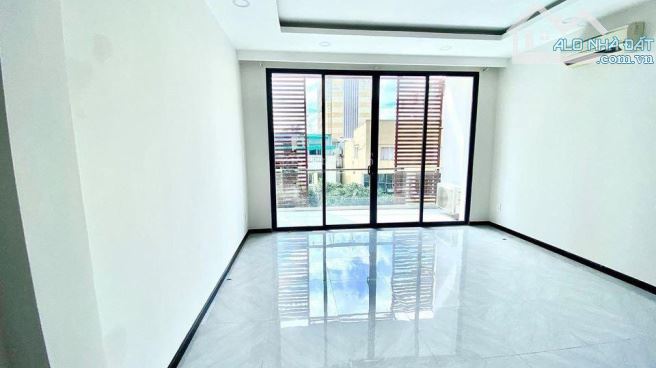 Cho thuê liền kề Hàm Nghi 75m2, 4 tầng, lô góc, thang máy, mới, oto tải đỗ cửa - 1