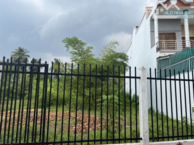 Bán 725 m2 đất có thổ cư mặt đường nhựa xe 16 chỗ cách Lê Việt Thắng 70m,phường 5 Mỹ Tho - 2