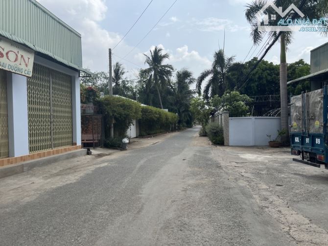 Bán 725 m2 đất có thổ cư mặt đường nhựa xe 16 chỗ cách Lê Việt Thắng 70m,phường 5 Mỹ Tho - 5