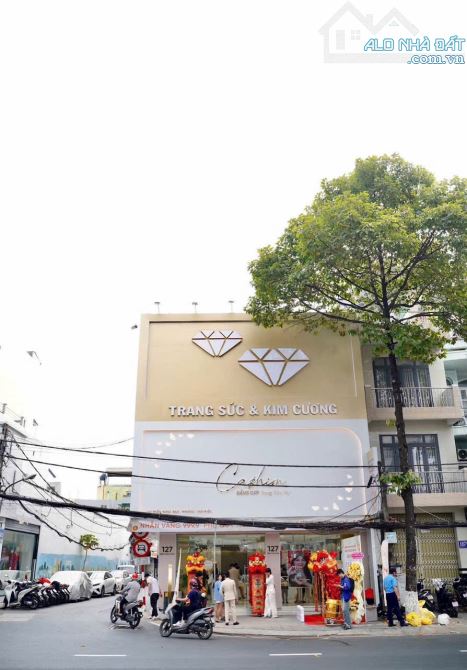 cho thuê nhà góc 2 mặt tiền đưởng trần hưng đạo, trệt 2 lầu,  ngang trên 8m - 5