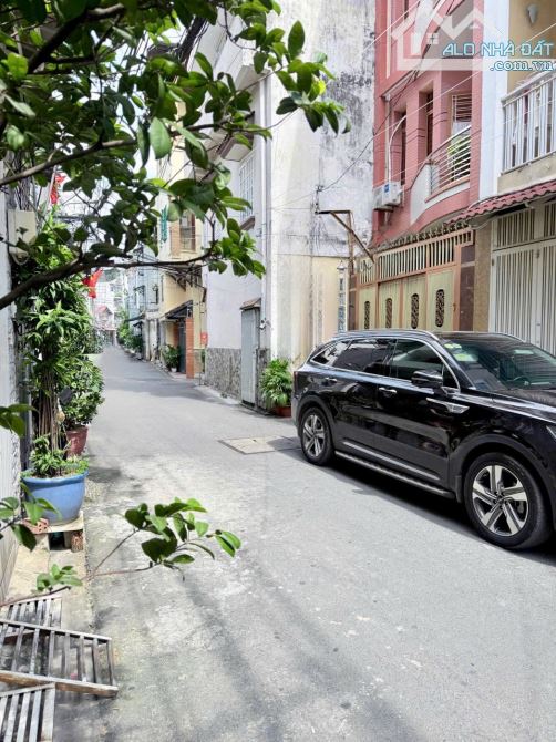 CĂN HỘ DỊCH VỤ HẺM XE HƠI HUỲNH VĂN BÁNH, PHÚ NHUẬN, 45M², 4 TẦNG, 7 PHÒNG, THUÊ 25 TRIỆU/ 4